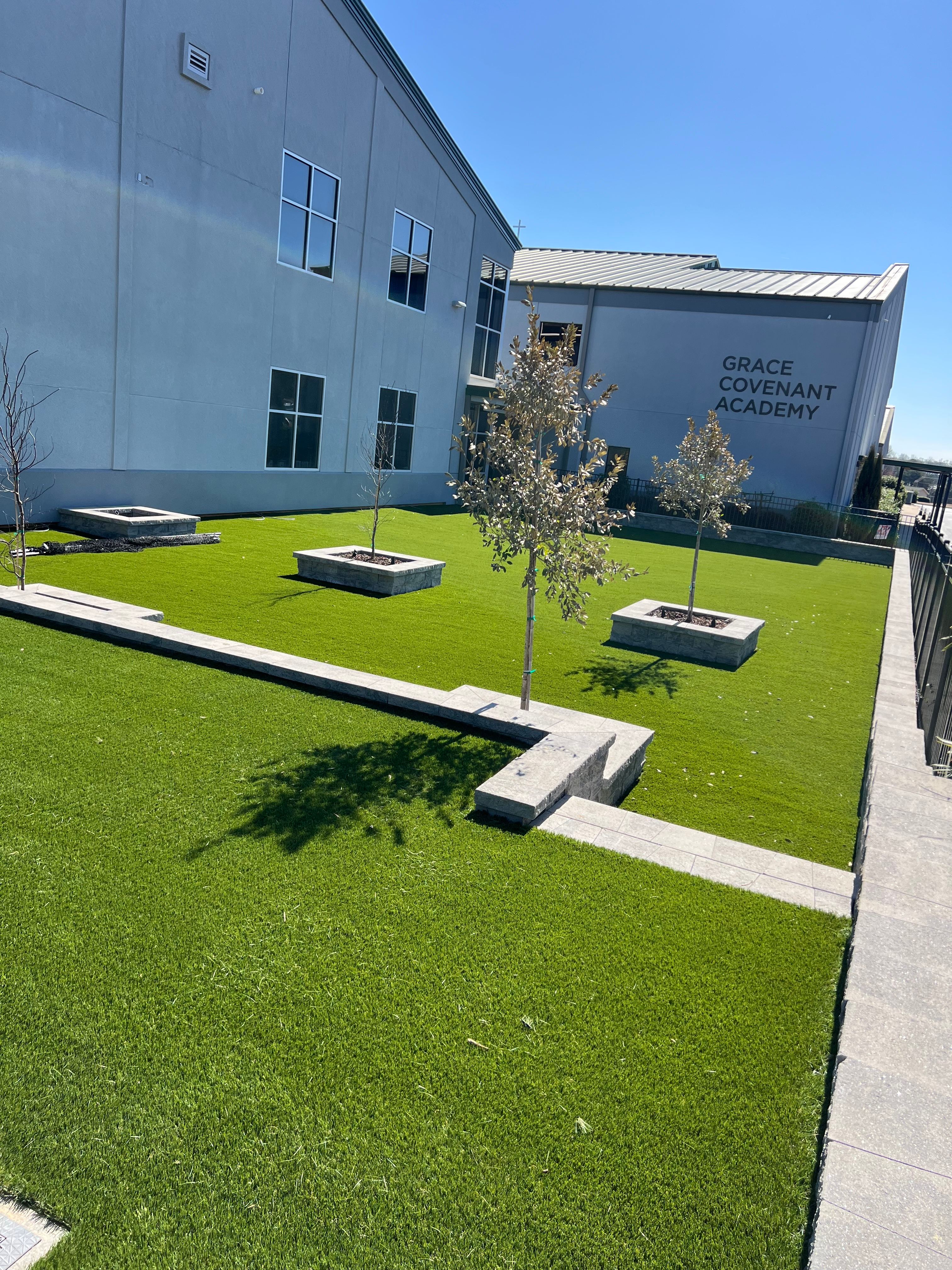 A vibrant and safe school playground with durable artificial turf.